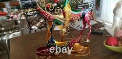 2 Multi Colored Metal Wire Withglitter Reindeer from Pier 1 Imports. 24 and 16