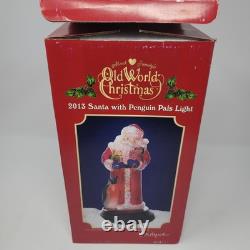 2013 Old World Christmas'Penguin Pals' Glass Santa Light Works withBox Merck