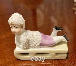 7 Antique German Bisque Porcelain Snow Babies Skaters, Sledders, Seated RARE