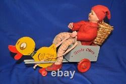 ANTIQUE GERMANY Candy Container Easter Pull Toy Cart w Composition Boy Elf 9