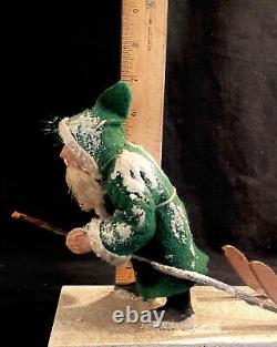Antique German Christmas Green Coat Trudging Santa Claus pulling Sleigh