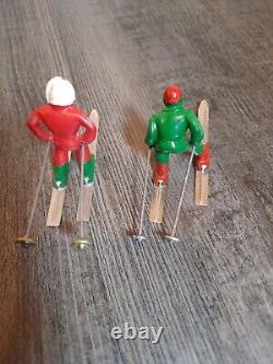 Barclay metal Christmas Village figures skiers skaters sled with horse