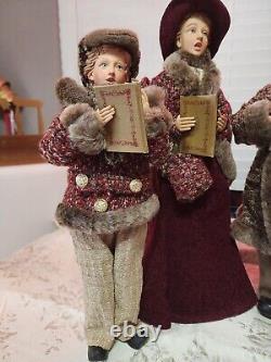 Carolers figurines 4 Christmas real clothing resin. The tallest 20 & 16 Rare