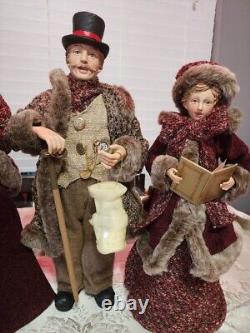 Carolers figurines 4 Christmas real clothing resin. The tallest 20 & 16 Rare