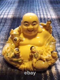 Carved resin Buddah with playing children figure. Finely crafted, signed. Rare