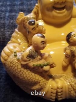 Carved resin Buddah with playing children figure. Finely crafted, signed. Rare