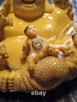 Carved resin Buddah with playing children figure. Finely crafted, signed. Rare