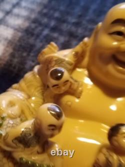 Carved resin Buddah with playing children figure. Finely crafted, signed. Rare