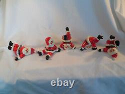 Fitz & Floyd vintage porcelian tumbling Santa figures set of (5) 1976