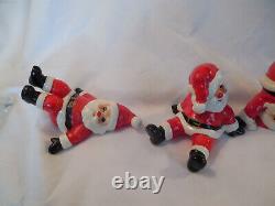 Fitz & Floyd vintage porcelian tumbling Santa figures set of (5) 1976