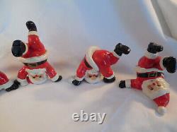 Fitz & Floyd vintage porcelian tumbling Santa figures set of (5) 1976