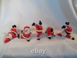 Fitz & Floyd vintage porcelian tumbling Santa figures set of (5) 1976