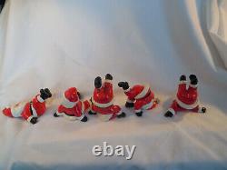 Fitz & Floyd vintage porcelian tumbling Santa figures set of (5) 1976