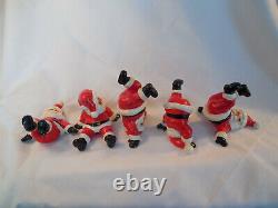 Fitz & Floyd vintage porcelian tumbling Santa figures set of (5) 1976