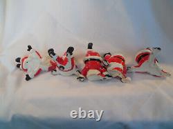 Fitz & Floyd vintage porcelian tumbling Santa figures set of (5) 1976