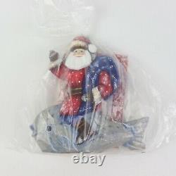 G. DeBrekht, Woodcarved Hand Painted Santa on Whale Figurine #6/250