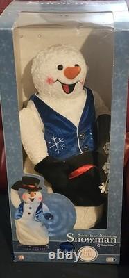 Gemmy Snowflake Spinning Snowman Plush with Blue Vest In Box