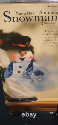 Gemmy Snowflake Spinning Snowman Plush with Blue Vest In Box