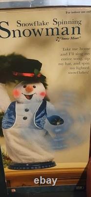 Gemmy Snowflake Spinning Snowman Plush with Blue Vest In Box