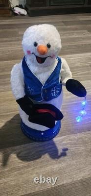 Gemmy Snowflake Spinning Snowman Plush with Blue Vest In Box