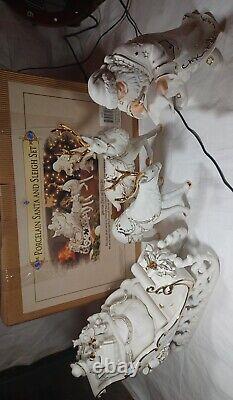 Grandeur Noel Porcelain Santa and Sleigh Reindeer White Set Collectors Edition
