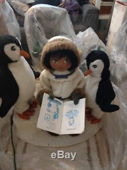 Harold Gale Eskimo reading to penguins
