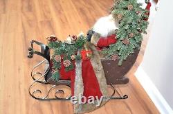 LARGE Jolly Santa in a Sleigh 27x24 Faux Leather Sleigh Faux Fur trim with toys