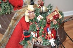 LARGE Jolly Santa in a Sleigh 27x24 Faux Leather Sleigh Faux Fur trim with toys