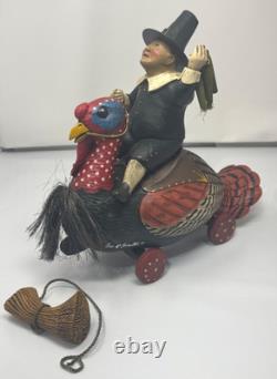 Leo Smith Folk Art Thanksgiving Pilgrim Riding Turkey Figurine