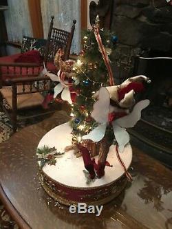 Mark Roberts'90s vintage rotating fairies decorating Christmas tree