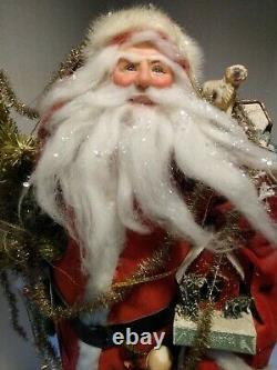 OOAK Artist Santa Claus Doll by Lois Clarkson carrying Antique Toys