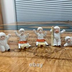 RARE! HERTWIG GERMAN BISQUE SNOWBABY KNEELS ON ONE KNEE + 4 other unnamed pcs