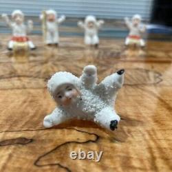 RARE! HERTWIG GERMAN BISQUE SNOWBABY KNEELS ON ONE KNEE + 4 other unnamed pcs