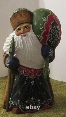 Russian Ceprueb Nocag Santa Skiing painted Christmas Ornaments Signed Bum Russia