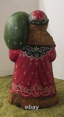 Russian Ceprueb Nocag Santa Skiing painted Christmas Ornaments Signed Bum Russia