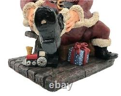 Santa Putting On Shoes Smiling Statue Hand Sculpted Signed CAWW Studio Christmas