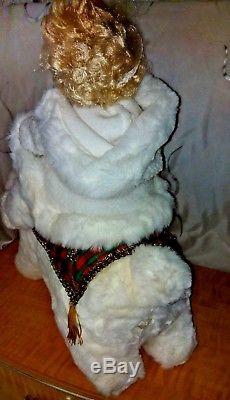 Santa's Best Christmas Animated Collectible snow baby girl doll riding the bear