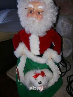 Santas best animated Santa with barking puppy in sack
