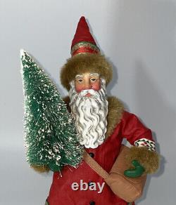 VGT All Hand Maid Santa Clause Holding Snowed Pine Tree Santa Statue, 12.5/H