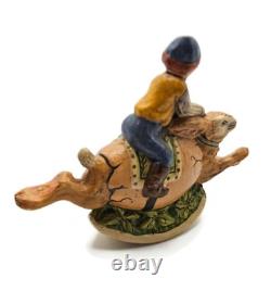 Vaillancourt Limited Edition Boy Riding Bunny in Egg Rocker Chalkware Figurine