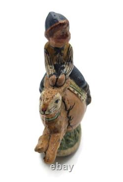 Vaillancourt Limited Edition Boy Riding Bunny in Egg Rocker Chalkware Figurine