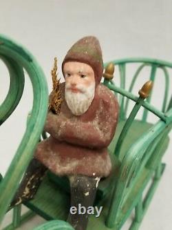 Vintage 1920's Belsnickle sitting with Sleigh and Deer Candy container