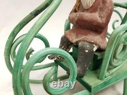 Vintage 1920's Belsnickle sitting with Sleigh and Deer Candy container