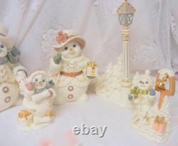 Vintage Grandeur Noel clection 2001 Christmas Porcelain Snowman Family Vilage