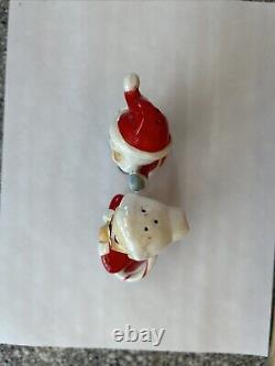 Vintage Japan Hula Hooping Santa and Mrs. Claus Salt And Pepper Shakers