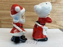 Vintage Japan Hula Hooping Santa and Mrs. Claus Salt And Pepper Shakers