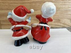 Vintage Japan Hula Hooping Santa and Mrs. Claus Salt And Pepper Shakers