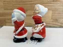 Vintage Japan Hula Hooping Santa and Mrs. Claus Salt And Pepper Shakers