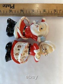 Vintage Japan Hula Hooping Santa and Mrs. Claus Salt And Pepper Shakers