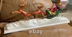 Vintage Rare wind up Santa with Moving Reindeer playing Jingle Bells